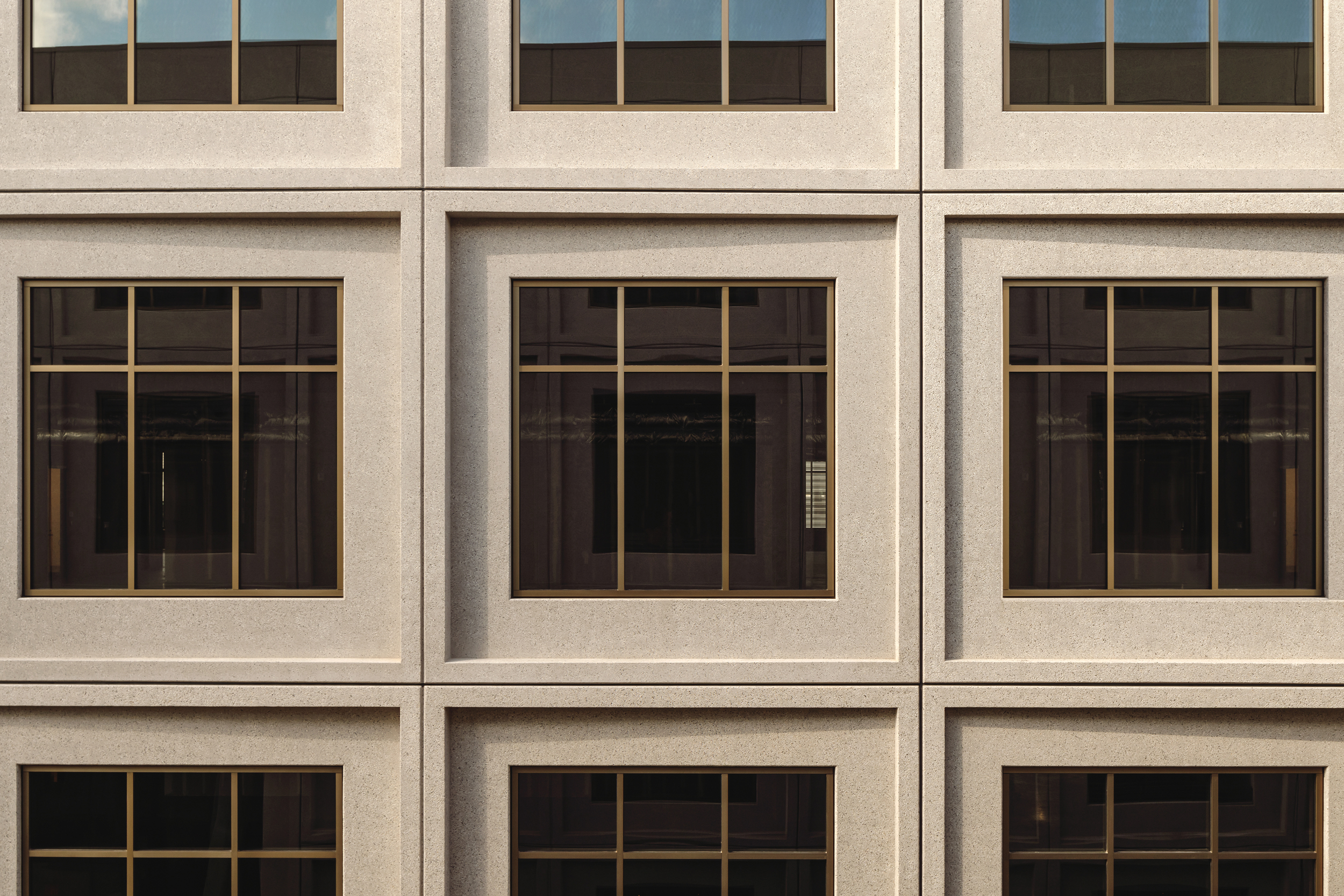 Close elevation study of the regular window grid and recessed openings