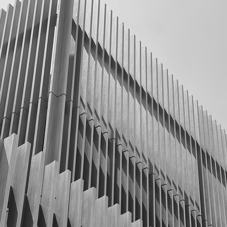 Close black and white view of the vertical timber fin screen