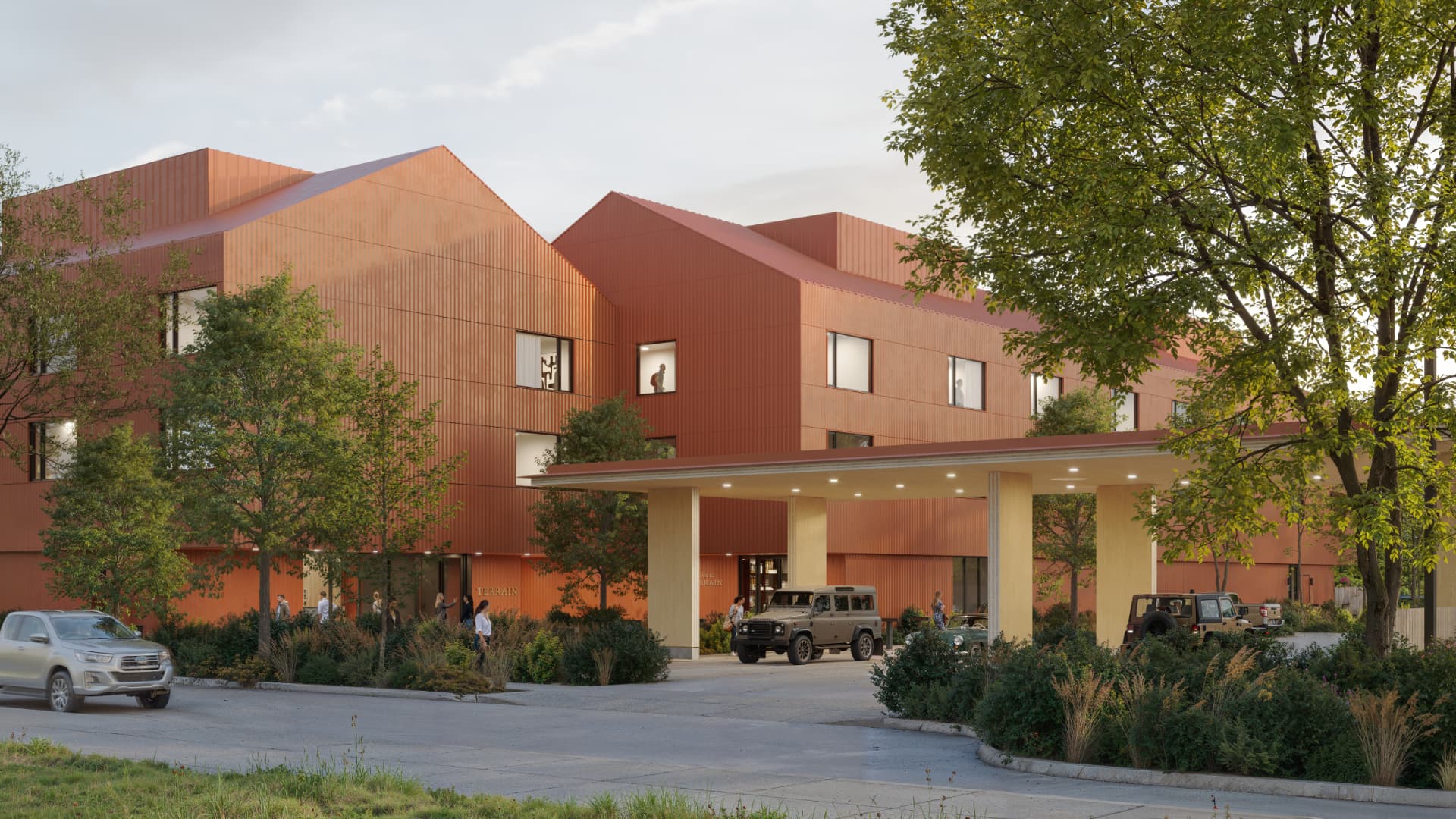 Terrain Hotel exterior arrival with copper-toned cladding and a porte-cochère